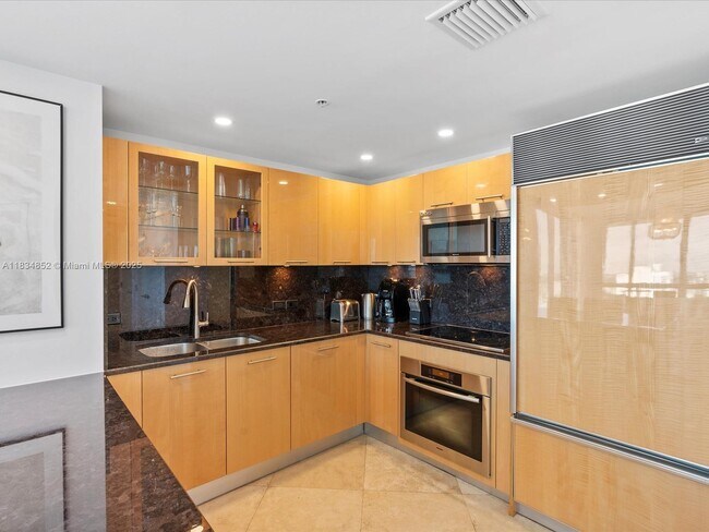 Building Photo - 6899 Collins Ave