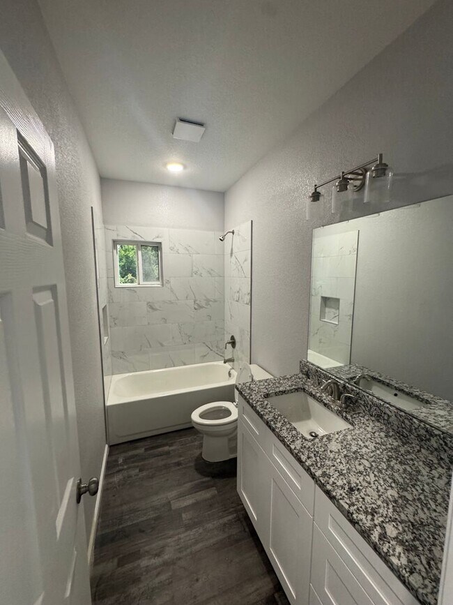 Building Photo - 3/2/2 NEW CONSTRUCTION Spacious YARD WITH ...