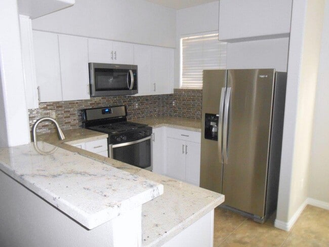 Building Photo - Beautiful Condo in The Falls Gated Communi...