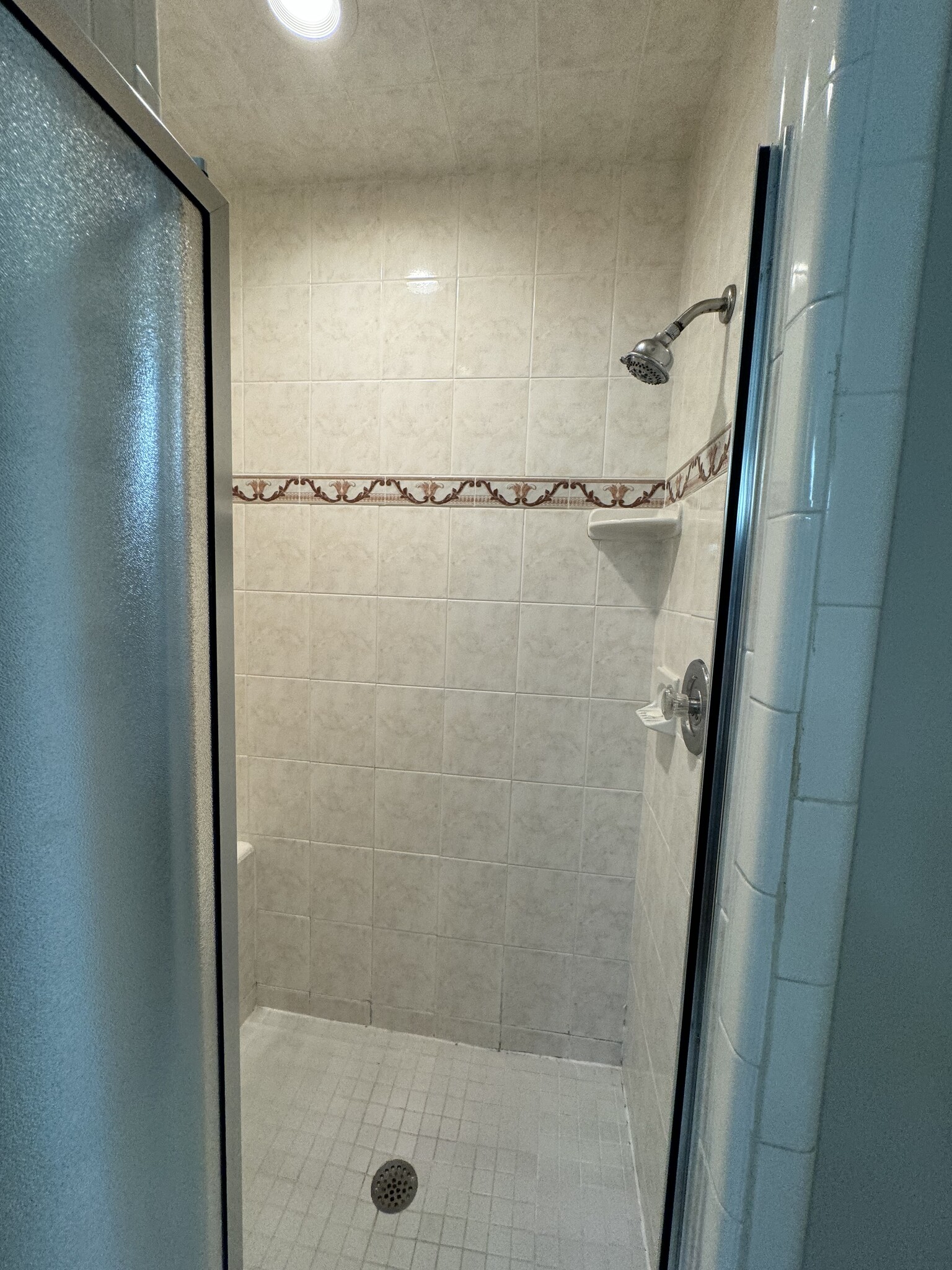 Walk in shower with built in seat - 10212 N 12th St