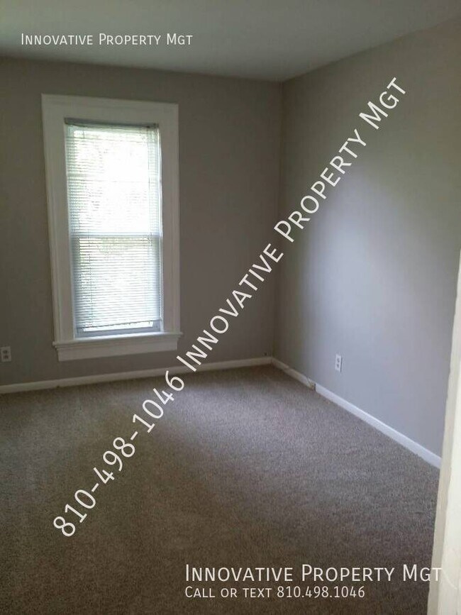 Building Photo - Spacious 4 bedroom , 1 1/2 bath home in Ga...