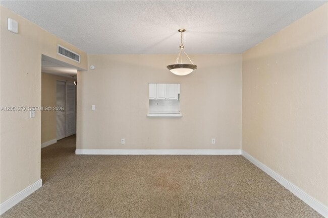 Building Photo - 19390 Collins Ave