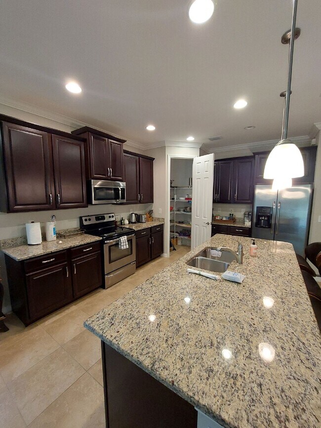 Building Photo - Luxurious Home in Toscana Isles Gated Community