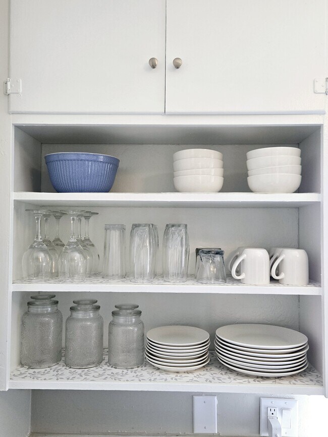 Fully stocked kitchen with table settings for 8 plus pots and pans - 205 Harvard Dr SE
