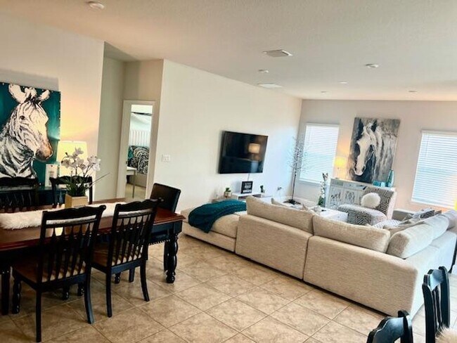 Building Photo - Open concept home offering four bedrooms, three baths, a two car garage and open lanai.