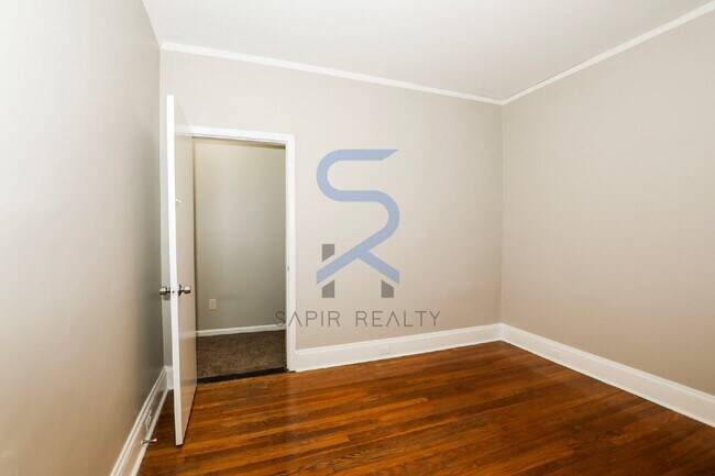 Building Photo - Move in before February 15th and choose your reward: a $250 Amazon Gift Card or a 55" Smart TV!