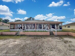 Building Photo - Make Yourself at Home — Your Duplex Dream Just Got Merrier! Charming 3-Bed, 2-Bath in Lehigh Acres