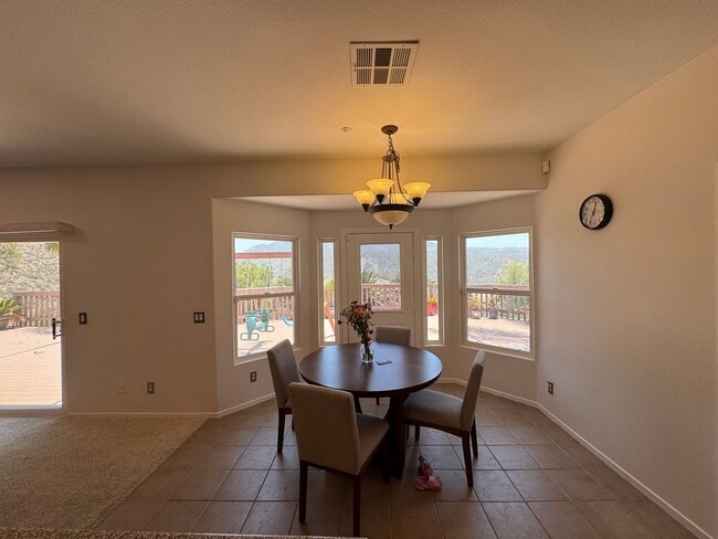 Building Photo - Stunning 4BR/3BA Pool Home in Singing Hill...