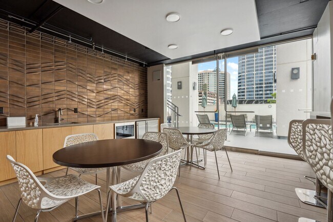 Building Photo - Modern 2-Bedroom Condo with Premium Amenit...