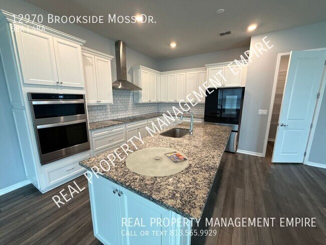 Building Photo - 12970 Brookside Moss Dr