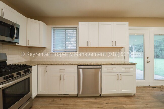 Building Photo - 11621 N 103rd E Ave