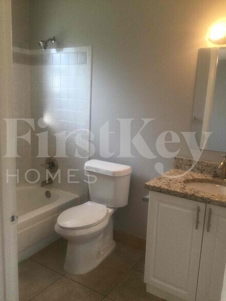 Building Photo - 5896 Triphammer Rd