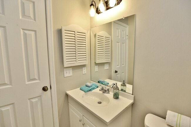 Building Photo - Updated End-Unit Brick Townhome Ready NOW!...