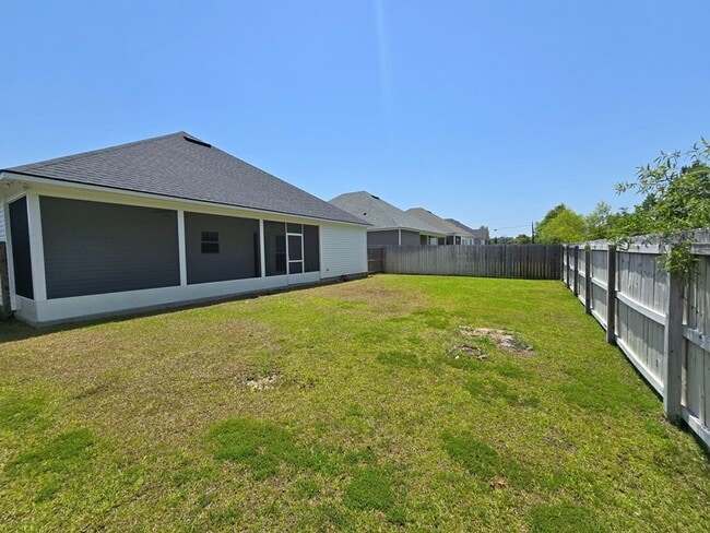 Building Photo - Stylish 4-Bedroom Home with Screened Porch...