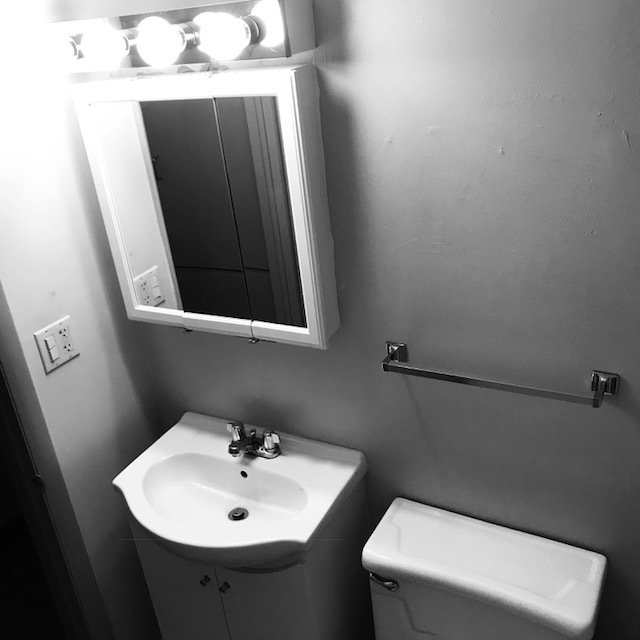 Lighted Bathroom - 419 A Ave N.W UNIT # 1