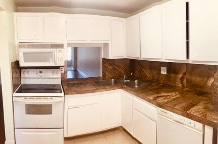 Building Photo - 6070 NW 64th Ave