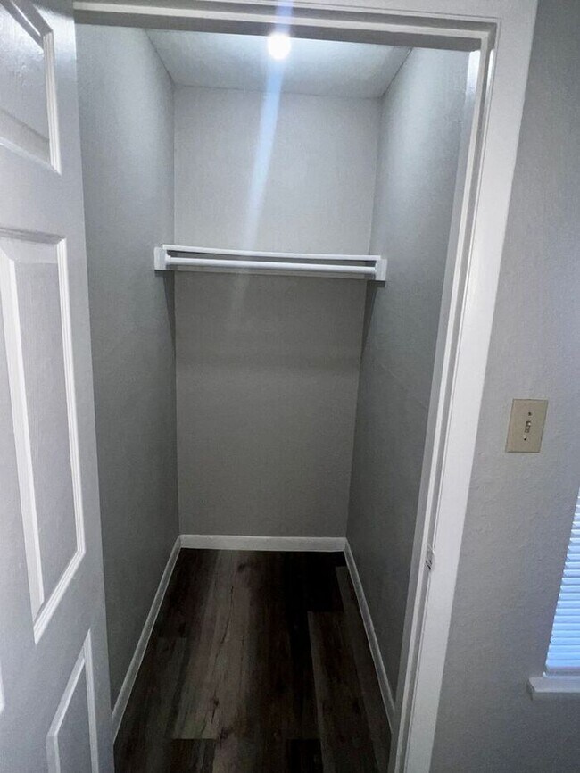Building Photo - 3/2 Regency Gardens 1st Floor Condo with New Plank Fooring, Stainless Appliances, and Fresh Paint!