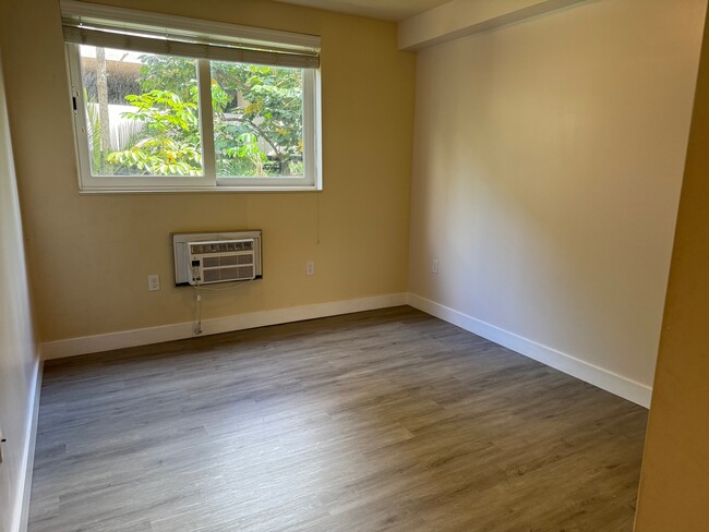 new flooring in the bedroom as well - 1800 Kaioo Dr