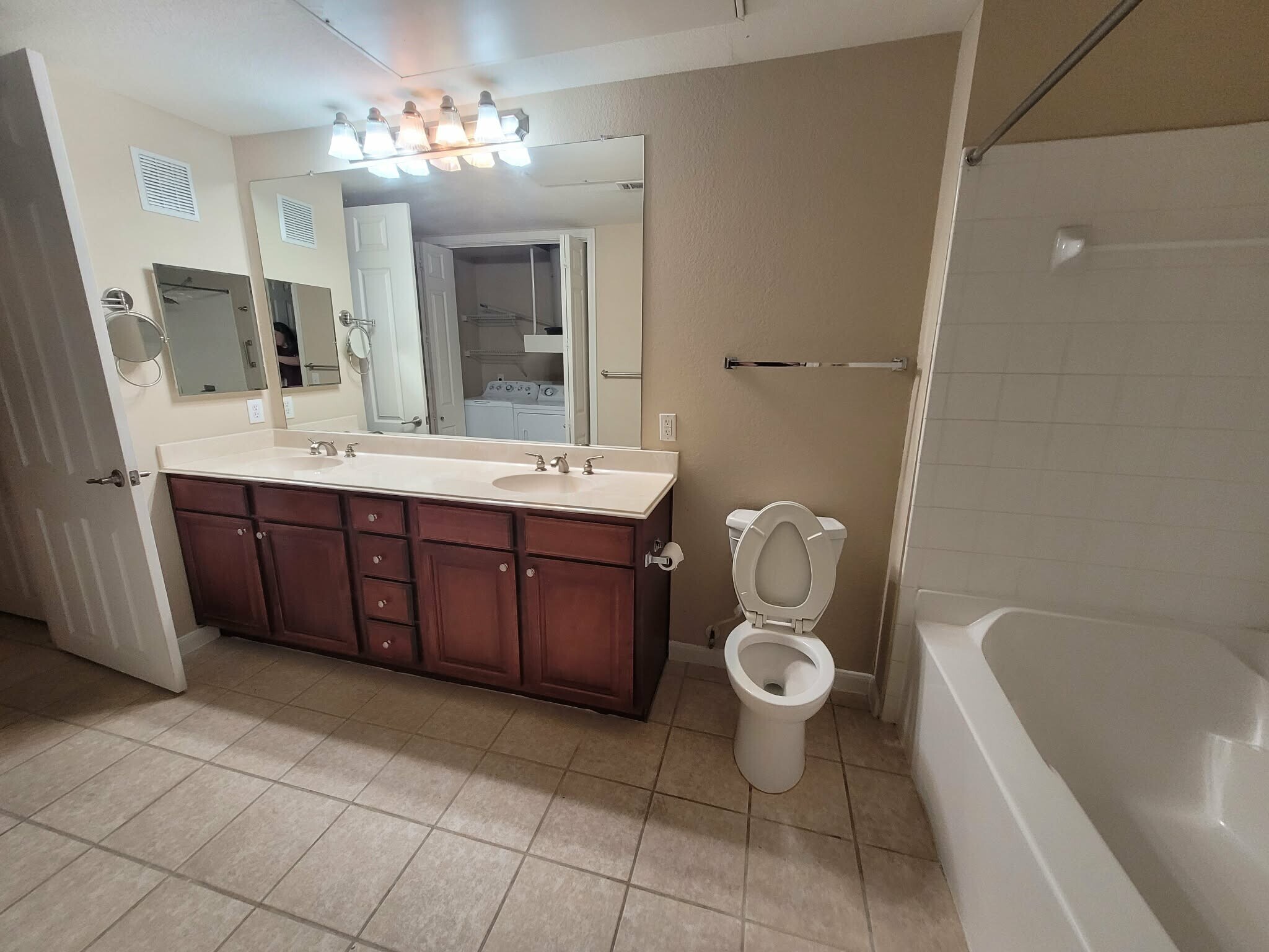Bathroom with dual vanity - 7575 Kirby Dr