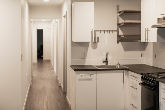 Shared kitchen and dining area. - 8801 Aurora Ave N