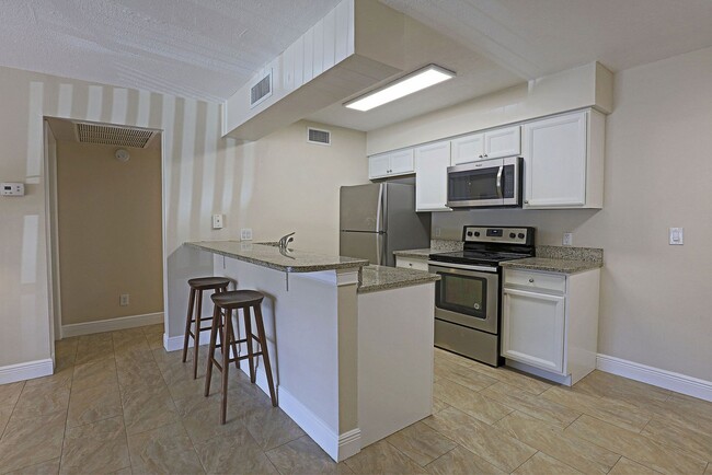 Building Photo - Mystic Gardens 5327-2707