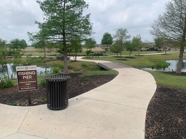 Building Photo - *COMING SOON* 3-Bedroom with Solar Panels & Resort Amenities – Pool, Gym!