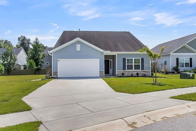 Building Photo - Spacious 4-Bedroom Home with Modern Upgrad...