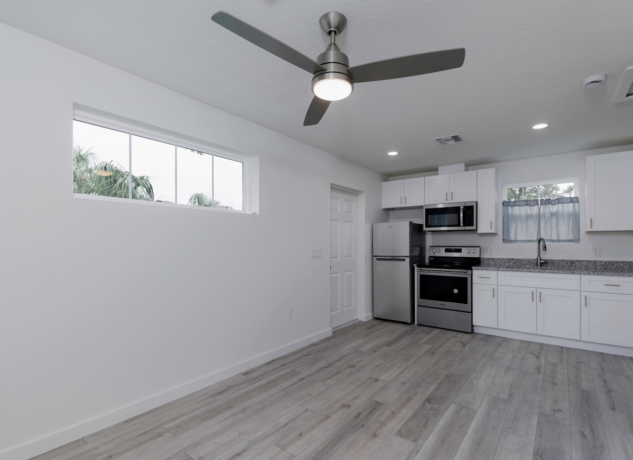 open living room/dining room - 2735 4th Ave S
