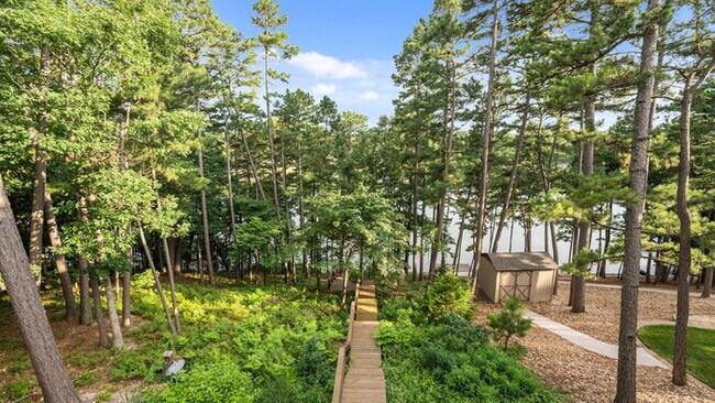 Building Photo - Serene Bella Vista Lakeside 4 bedroom