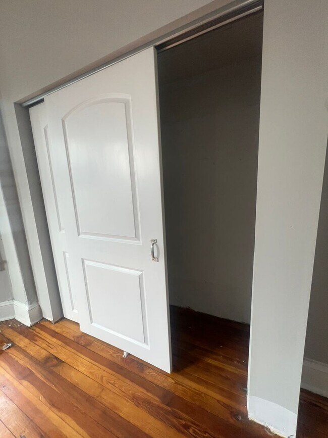 Building Photo - Oversized Classic Row Home w Wood Floors a...