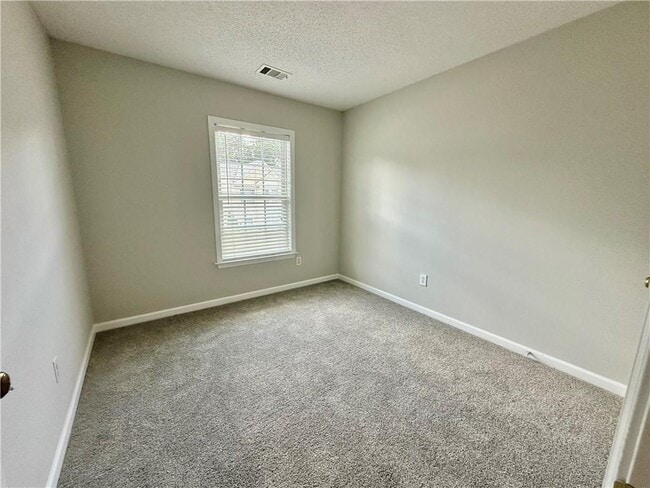 Building Photo - 9165 Nesbit Ferry Rd