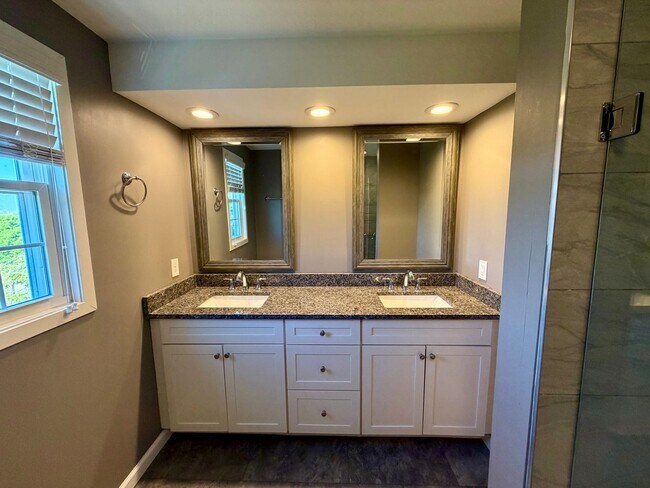 Building Photo - Modern Comforts Await: Spacious Rental with 2-Car Garage, Private Office, and Finished Basement w...