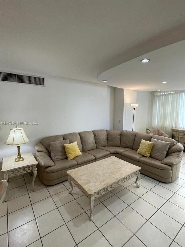Building Photo - 5005 Collins Ave