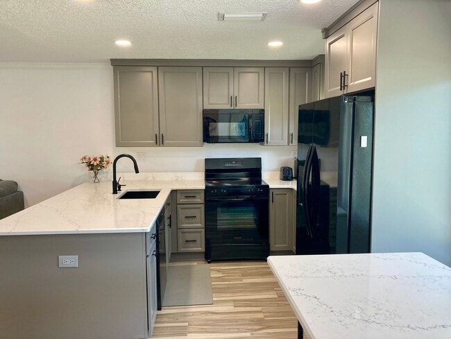 Building Photo - Completely remodeled waterfront condo!