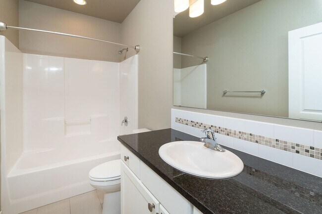 Building Photo - Spacious single level Orchard floorplan with 4th bedroom/den option home featuring SOLAR - Great ...