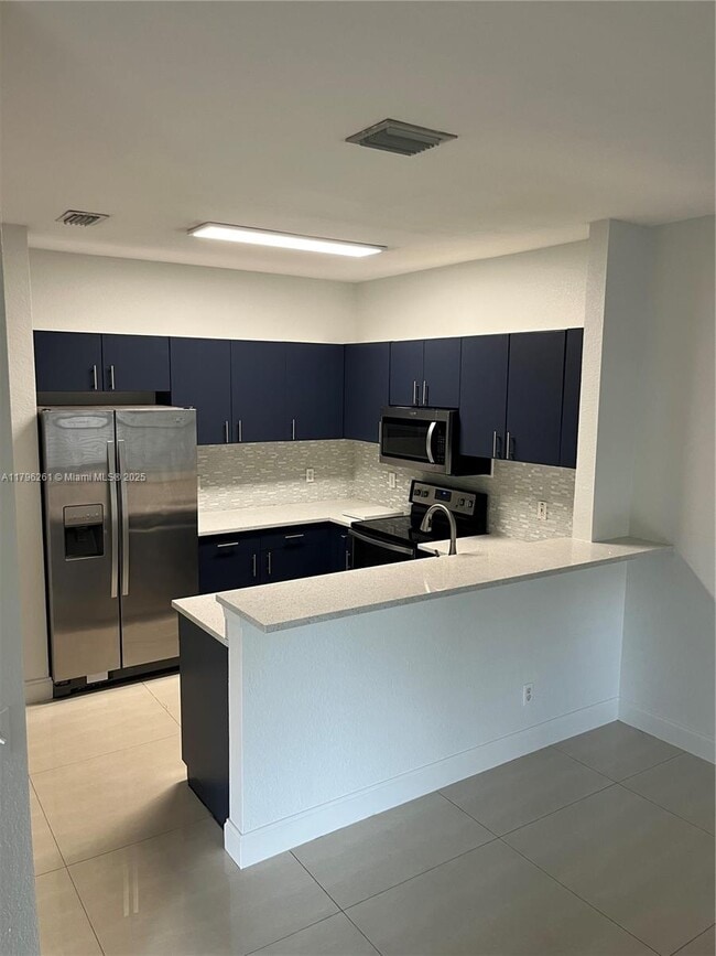 Building Photo - 5675 NW 120th Terrace