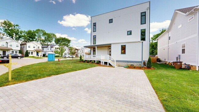 Building Photo - Turn-Key Luxury Rental: Brand-New 4BD + Office w/ Private Sunset Rooftop