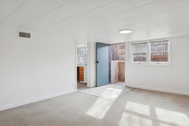 Building Photo - Bright & Updated 2-Bed Boulder Duplex with Huge Private Yard!!