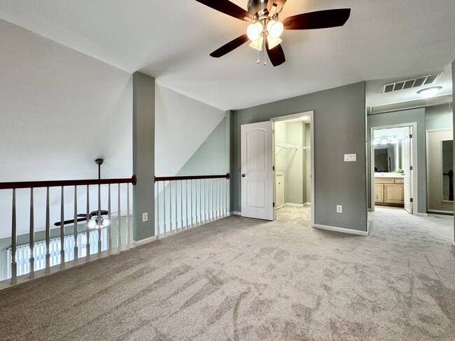 Building Photo - READY NOW!! End-Unit Loft-Style Condo w/1s...