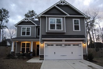 Building Photo - Spacious 4-Bedroom Home with Loft, New Car...