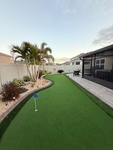 Miniature golf in back yard - 17014 Avon Dive Ln