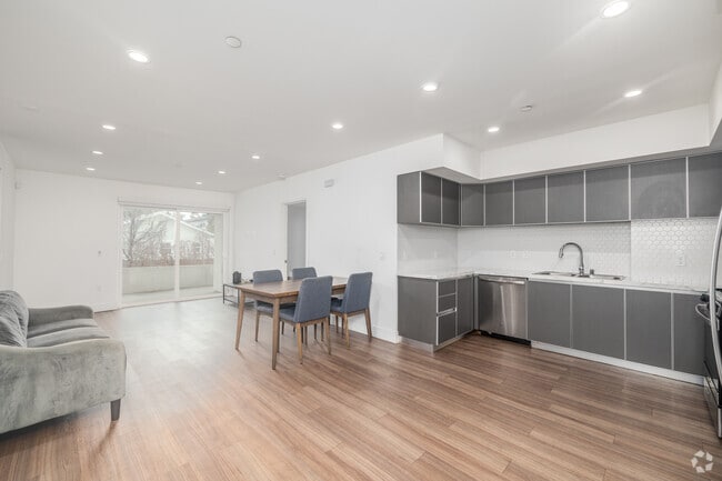 3BR, 2BA - 1,081SF - Living Room - 1450 S Barrington Ave