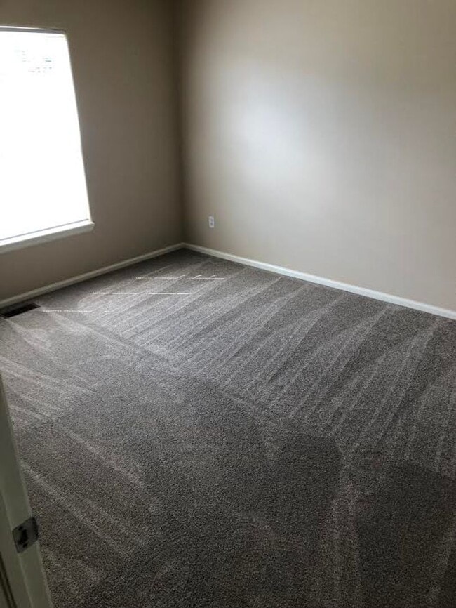 Building Photo - Fully Renovated, "MUST SEE" 3 Bedroom, 3 Bath Townhome with 2 Car Attached Garage