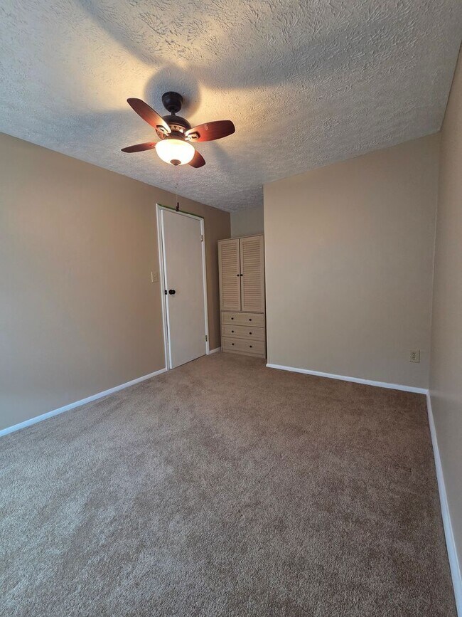 Building Photo - Serene Living in a Quiet Lakeside Community