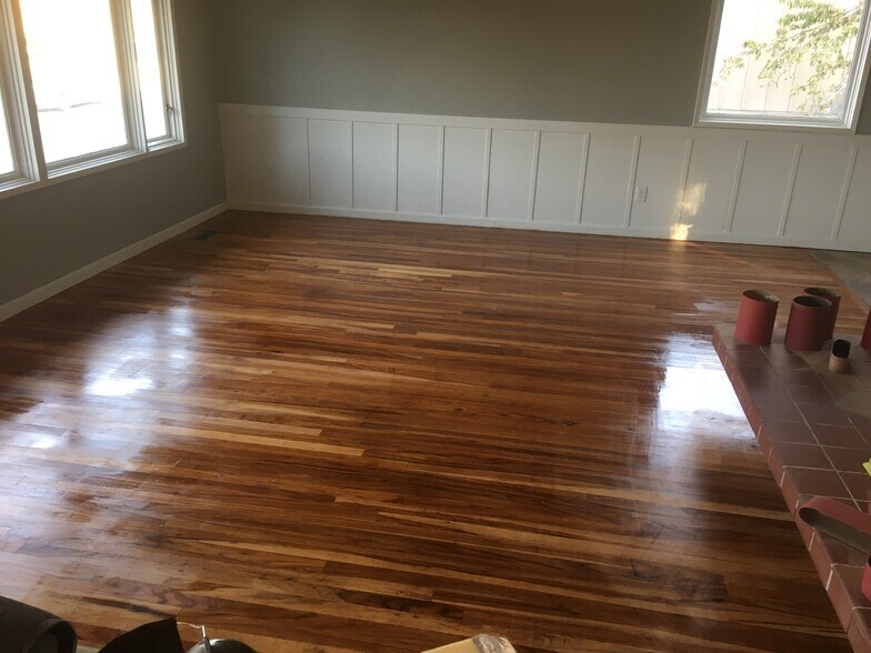 Upstairs Living Room floors Done - 3512 East Ben Burr Boulevard