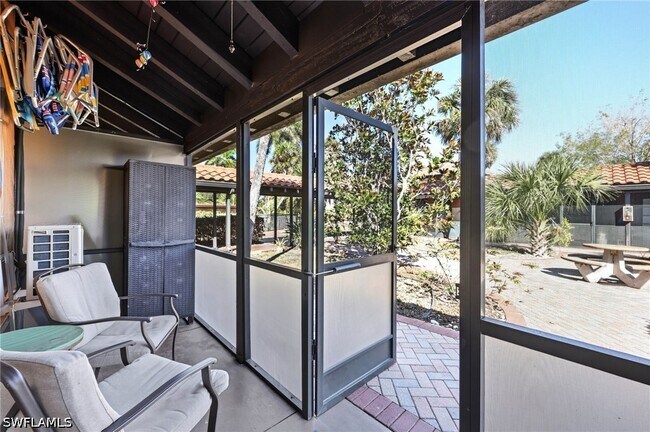 Building Photo - 25000 Tamiami Trl E