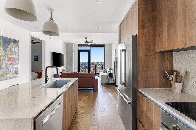 Building Photo - Luxury Condo with Skyline Views