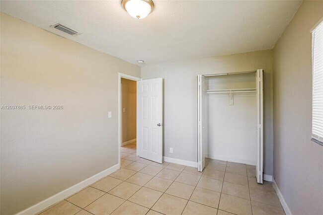 Building Photo - 5980 NW 24th Ct