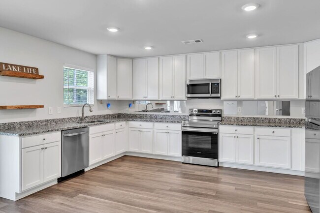 Building Photo - Stunning 3BR/2.5BA Home | Private Fenced Yard & Outdoor Oasis $2190/mo rent