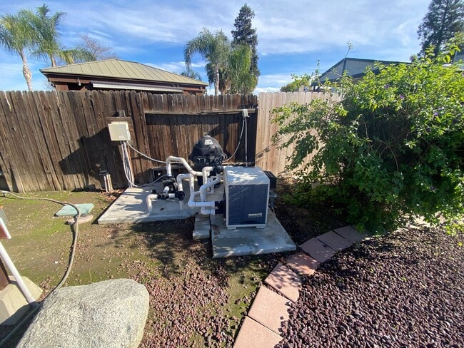 Building Photo - Get ready for Summer in this 3 BD 2 BA SW home with a Pool on a corner lot